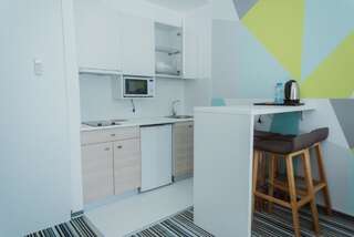 Апарт-отели Aparthotel Tangerine Батуми Семейный люкс-16